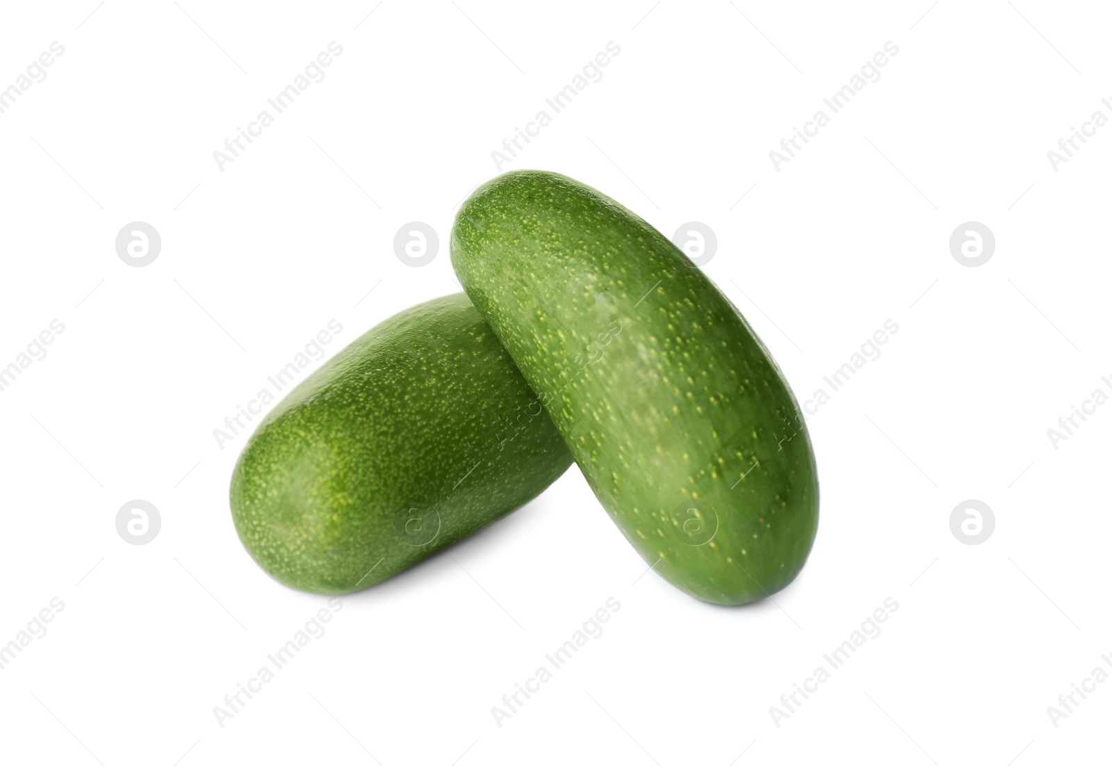 Photo of Fresh whole seedless avocados isolated on white