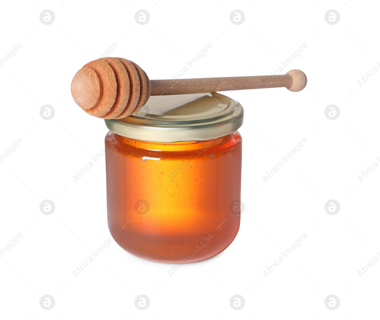 Photo of Tasty natural honey in glass jar and dipper isolated on white