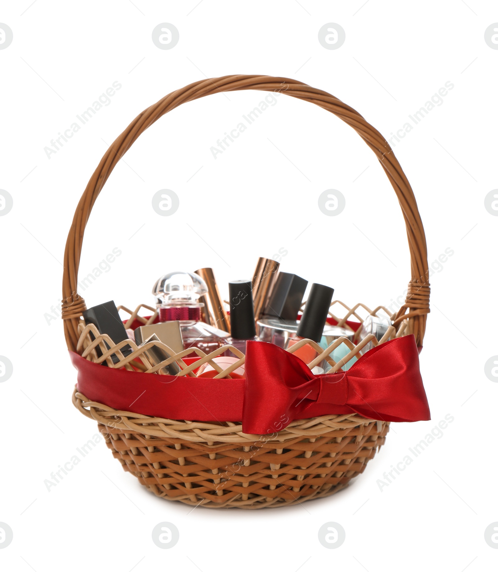 Photo of Gift set in wicker basket isolated on white