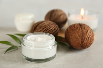 Beautiful spa composition with cream on marble table