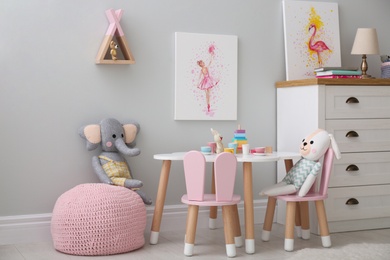 Children's room with modern furniture and pictures. Interior design