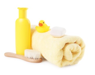 Baby cosmetic products, bath duck, brush and towel isolated on white