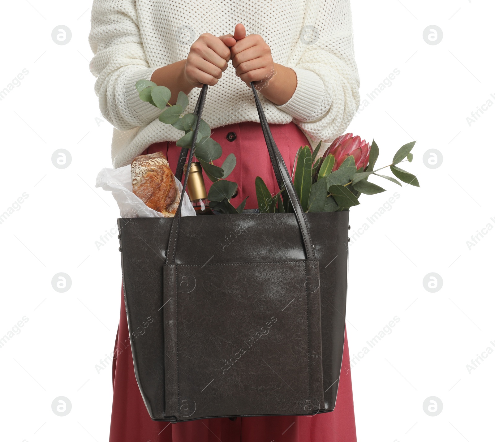 Photo of Woman holding leather shopper bag on white background, closeup