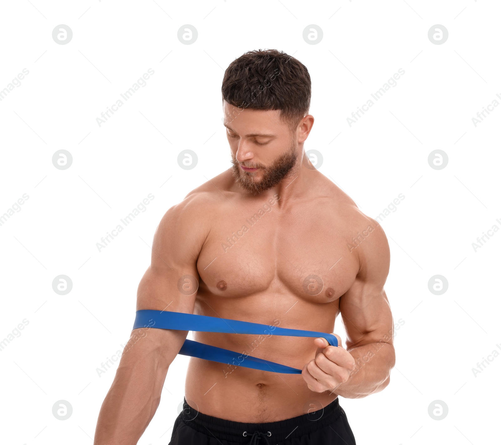 Photo of Young man exercising with elastic resistance band on white background