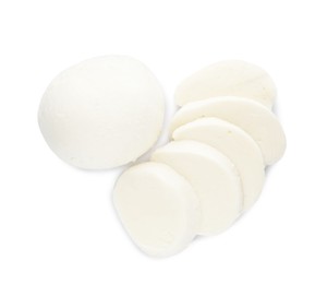 Delicious mozzarella cheese slices on white background, top view