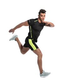 Photo of Sporty young man running on white background