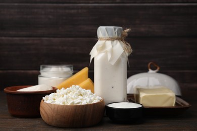 Different fresh dairy products on wooden table