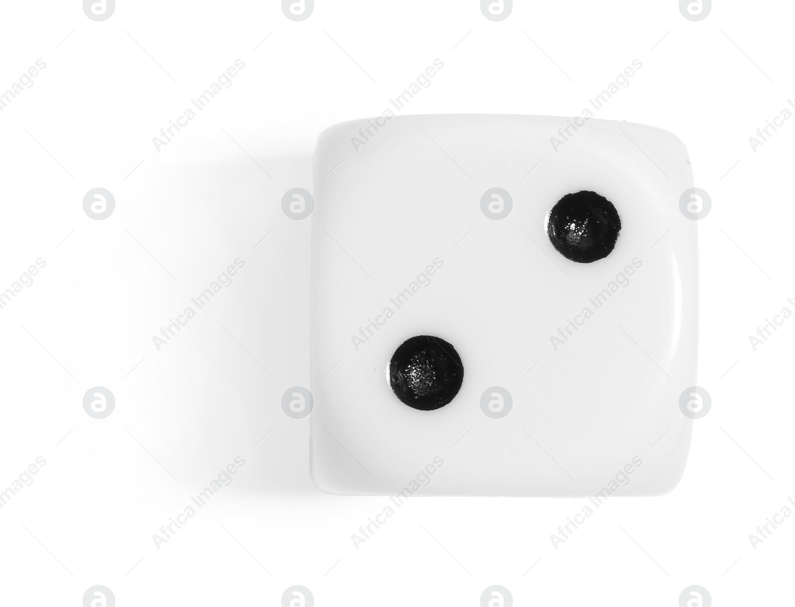 Photo of One game dice isolated on white, top view