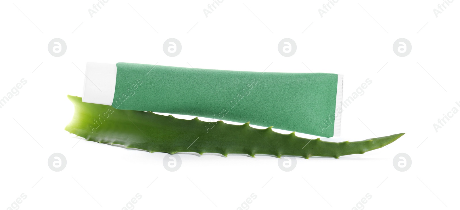 Photo of Tube of toothpaste with aloe vera leaf on white background