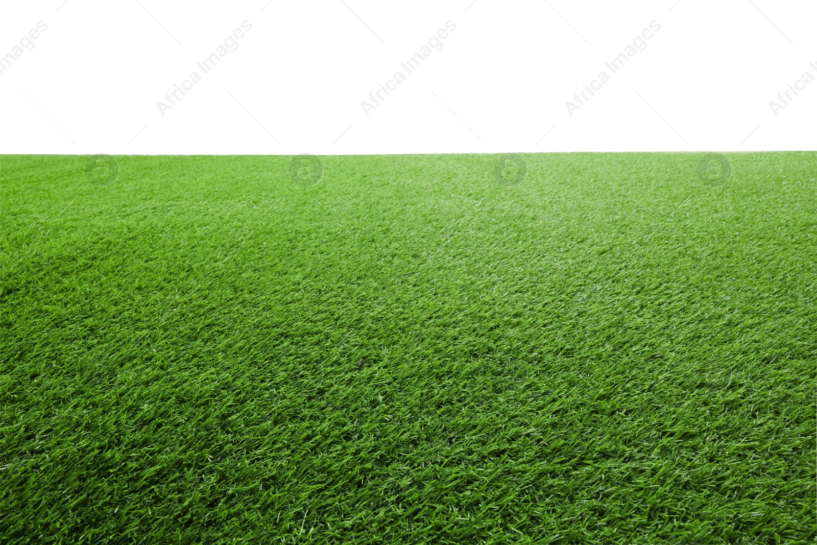 Photo of Green artificial grass surface isolated on white