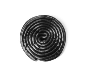 Photo of Tasty black liquorice candy isolated on white, top view