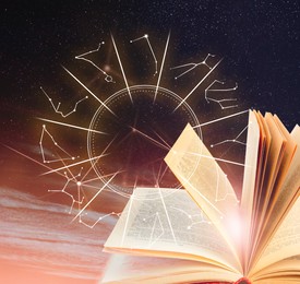 Image of Open book, illustration of zodiac wheel with astrological signs and starry sky at night