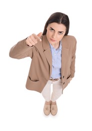 Beautiful businesswoman pointing at something on white background, above view