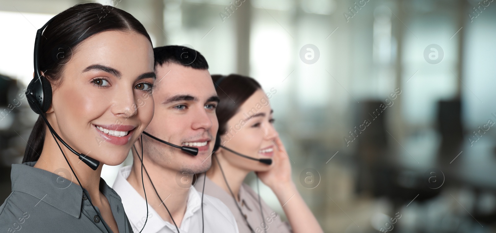 Image of Hotline operators with headsets in office, space for text. Banner design