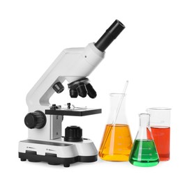 Laboratory glassware with colorful liquids and microscope isolated on white