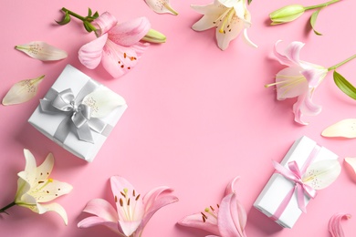 Photo of Flat lay composition with beautiful blooming lily flowers on color background