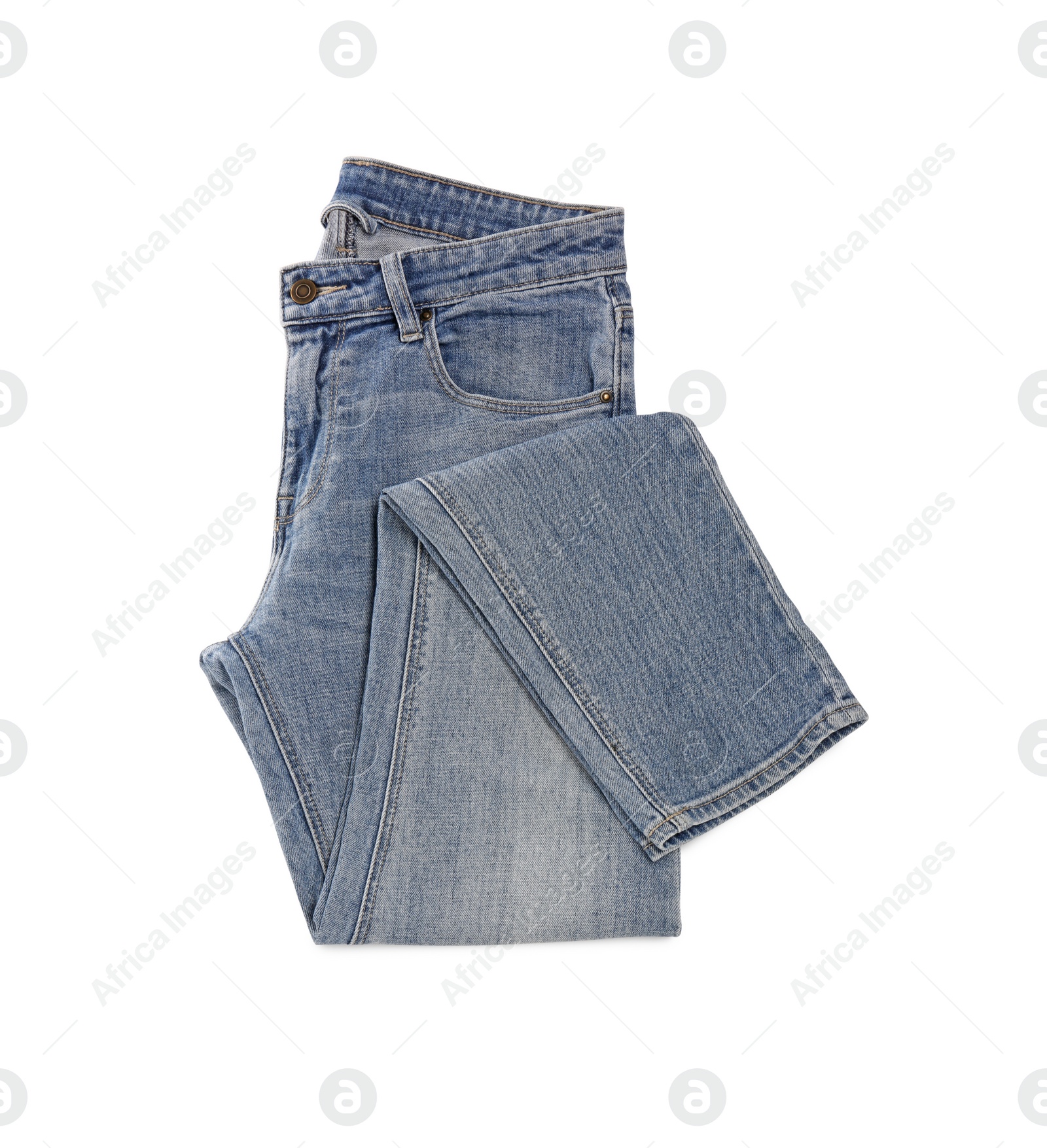 Photo of Stylish light blue jeans isolated on white, top view