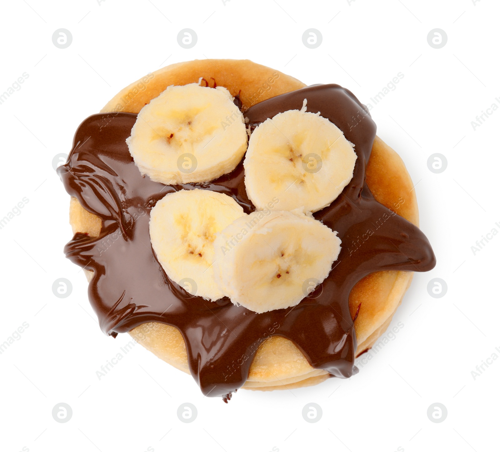 Photo of Tasty pancake with chocolate spread and banana slices isolated on white, top view