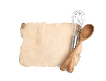 Photo of Old cookbook page and kitchen utensils on white background, top view. Space for text