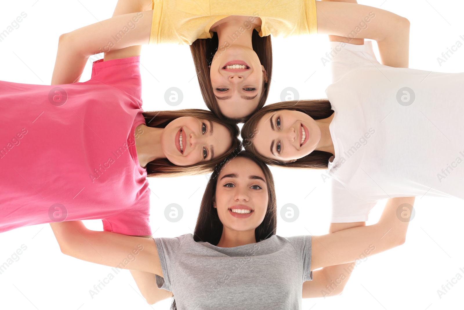 Photo of Beautiful young ladies hugging, bottom view. Woman's Day