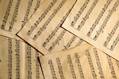 Photo of Many old note sheets as background, top view