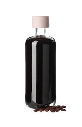 Photo of Bottle with coffee liqueur and beans isolated on white