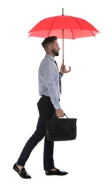 Businessman with red umbrella on white background