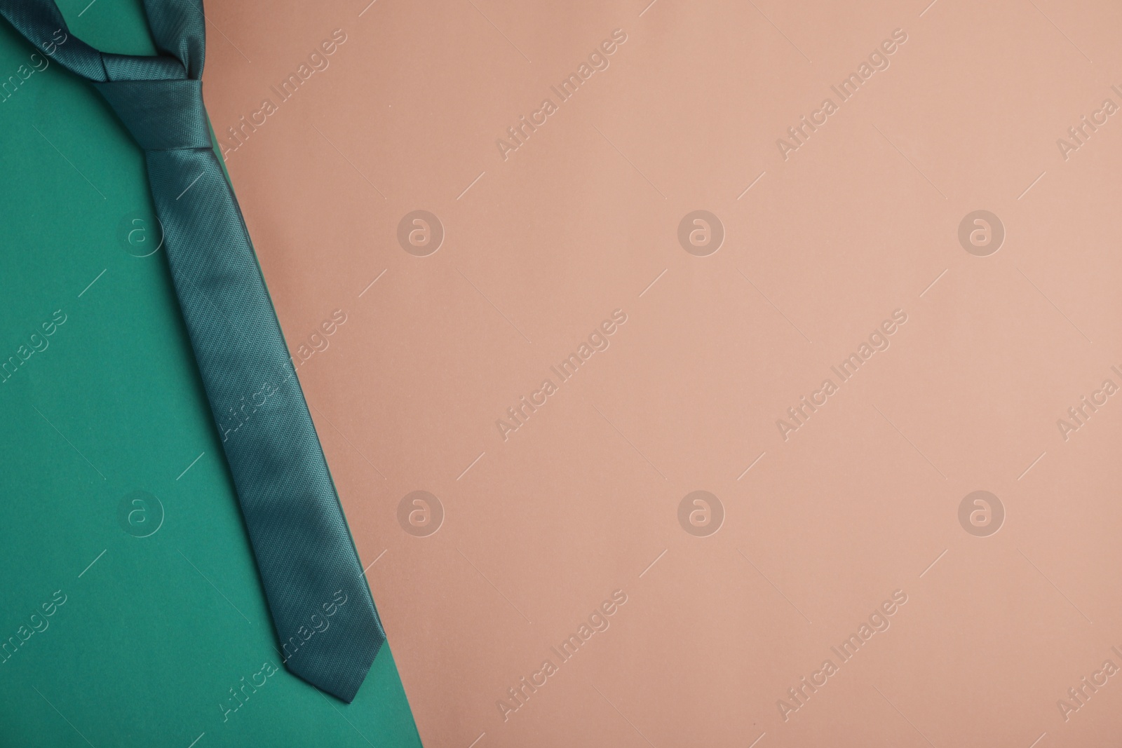 Photo of Flat lay composition with tie and space for text on color background.Happy Father's Day