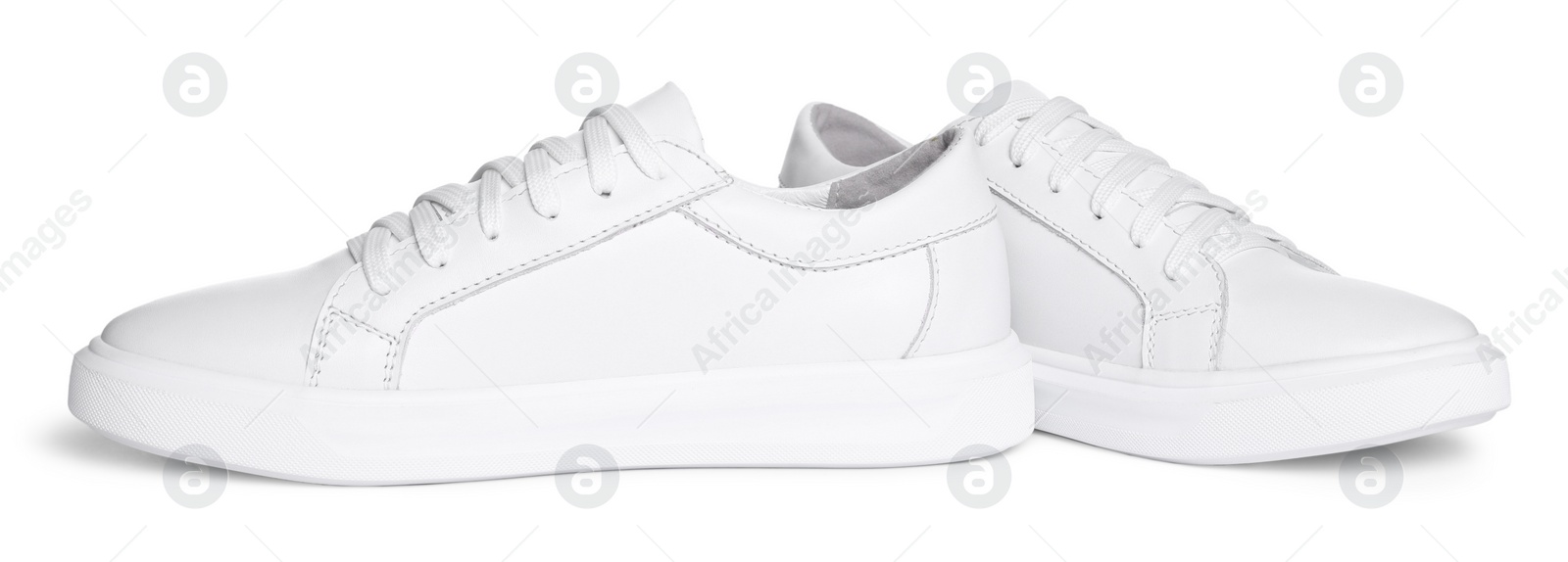 Photo of Pair of stylish sneakers isolated on white