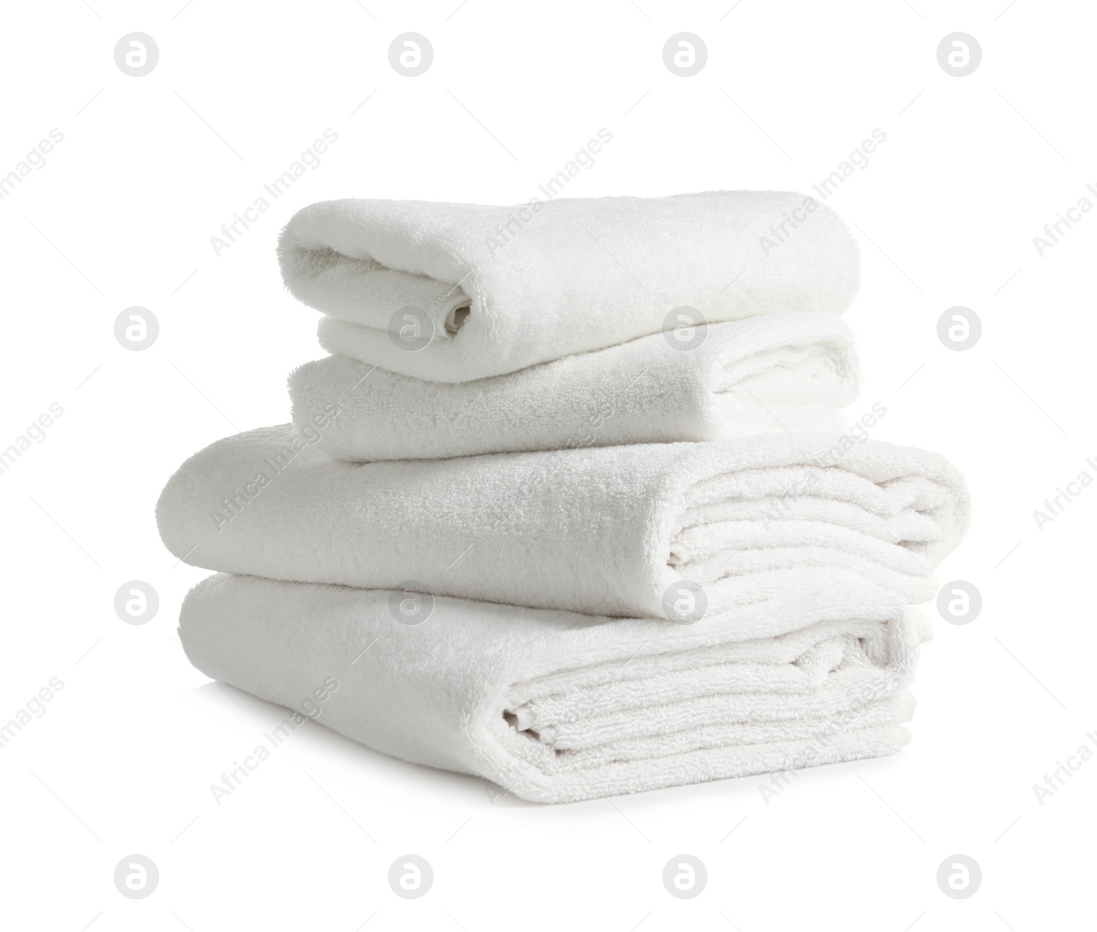 Photo of Stack of clean soft towels on white background