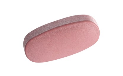 Photo of One pink pill isolated on white. Medicinal treatment