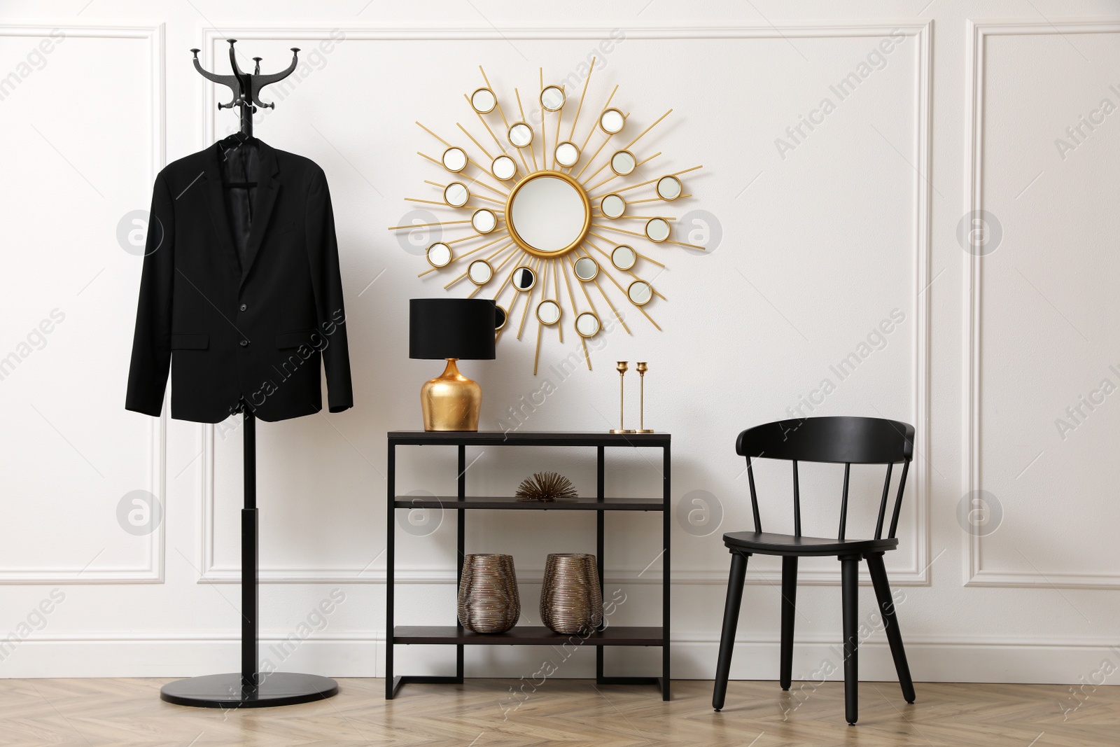 Photo of Hallway interior with console table near white wall