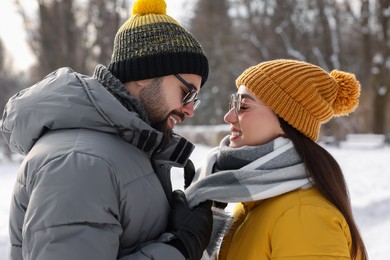 Beautiful happy couple spending time together on winter day