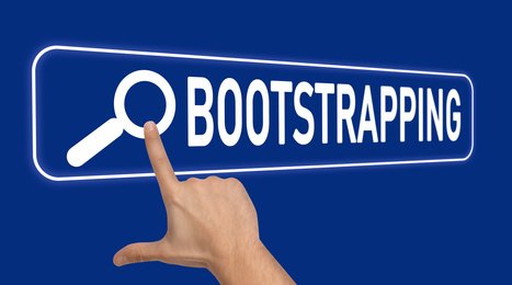Man touching virtual screen with word BOOTSTRAPPING in search bar on blue background, closeup