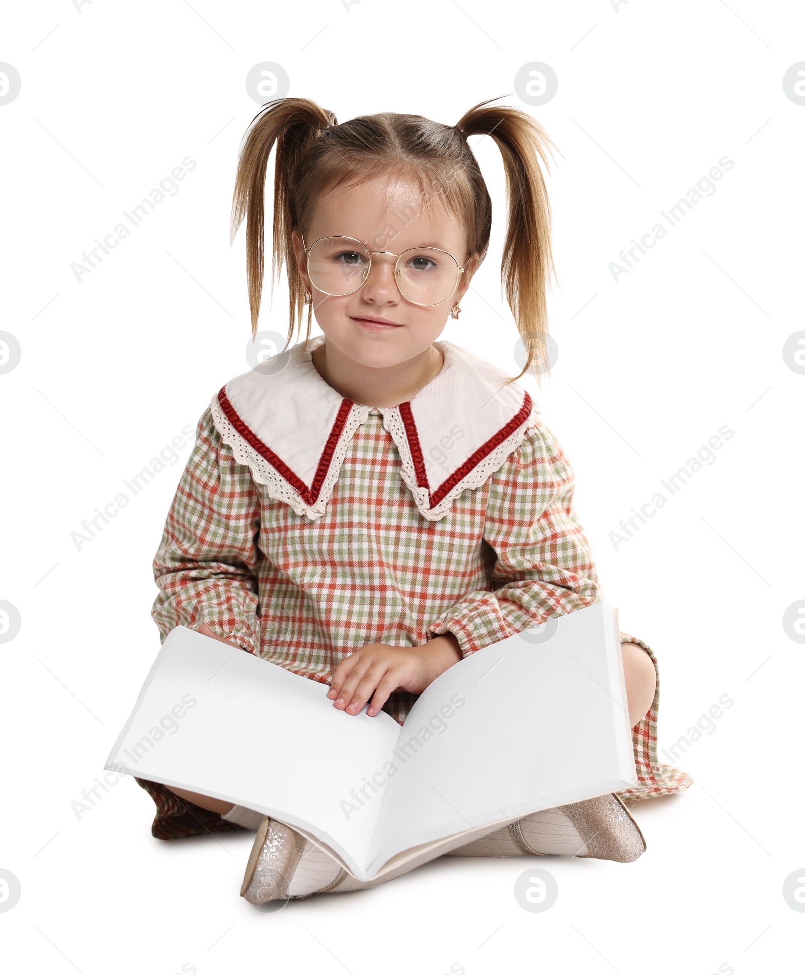 Photo of Cute little girl with book on white background