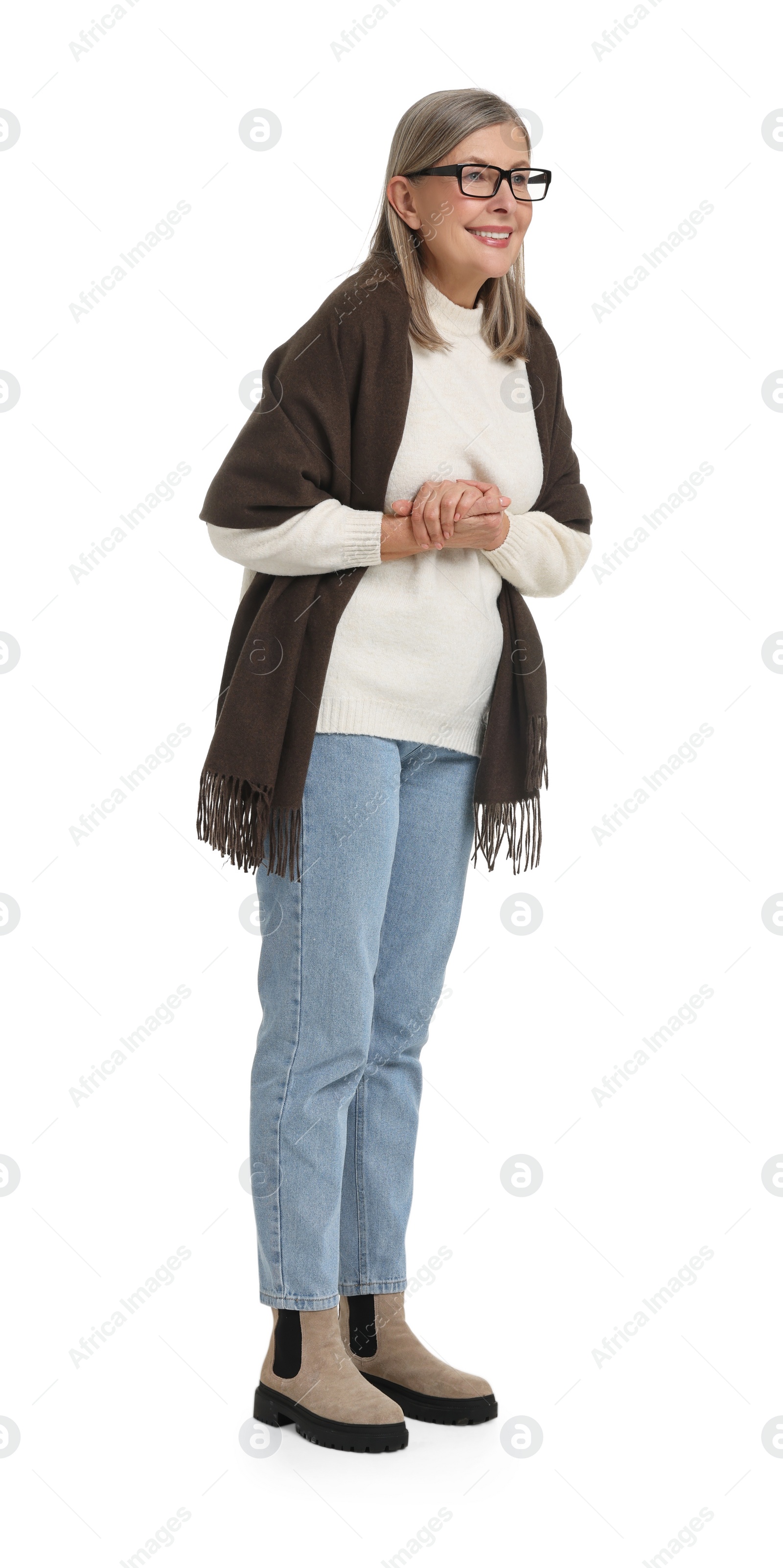 Photo of Full length portrait of senior woman on white background