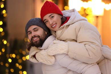 Photo of Lovely couple spending time together on city street