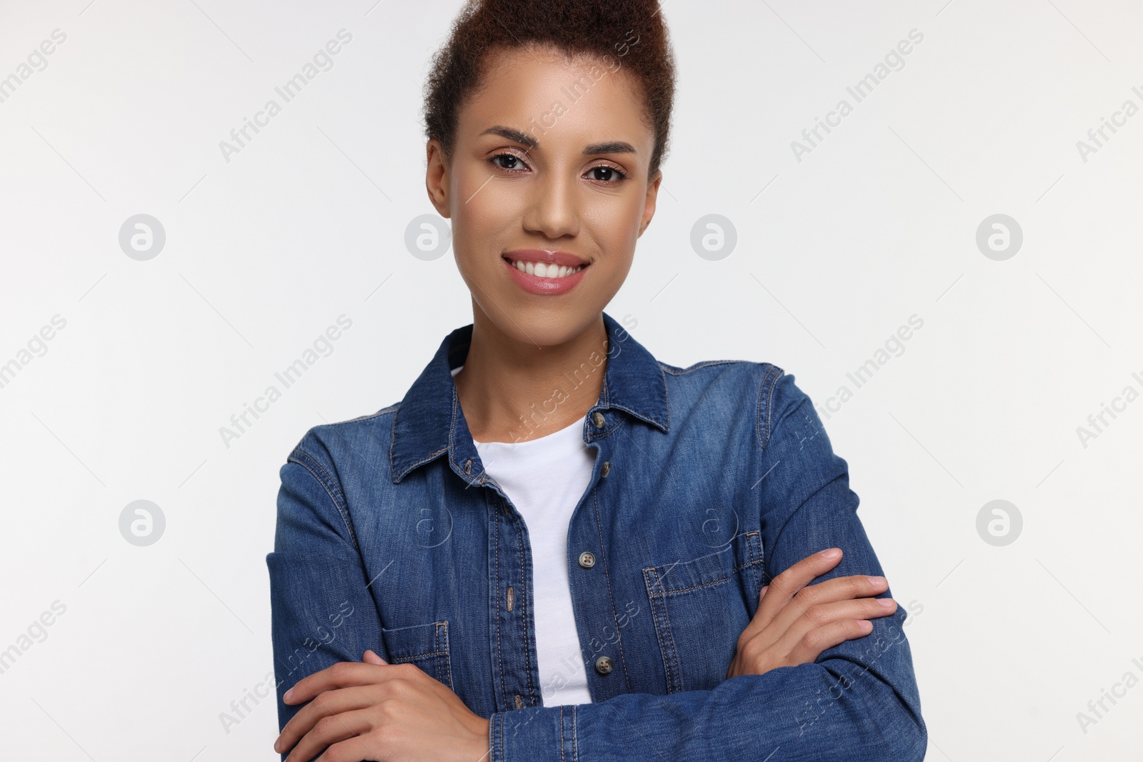 Photo of Portrait of beautiful young woman on white background