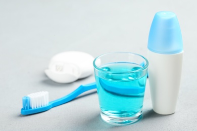 Set of oral care products on light background. Teeth hygiene