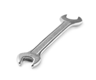 Photo of New wrench on white background. Plumber tools