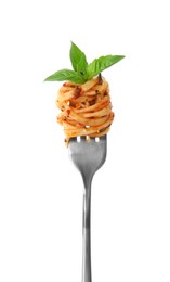 Photo of Fork with tasty pasta and basil isolated on white