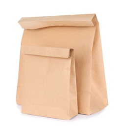 Photo of Paper bags isolated on white. Mockup for design