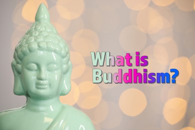 Image of Buddha statue and text What Is Buddhism against blurred lights