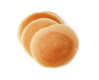Photo of Delicious pancakes isolated on white, top view