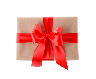 Photo of Christmas gift box decorated with ribbon bow on white background, top view