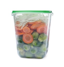 Fresh vegetables in plastic container isolated on white