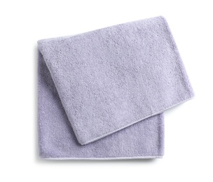 Photo of Soft folded towel isolated on white, top view
