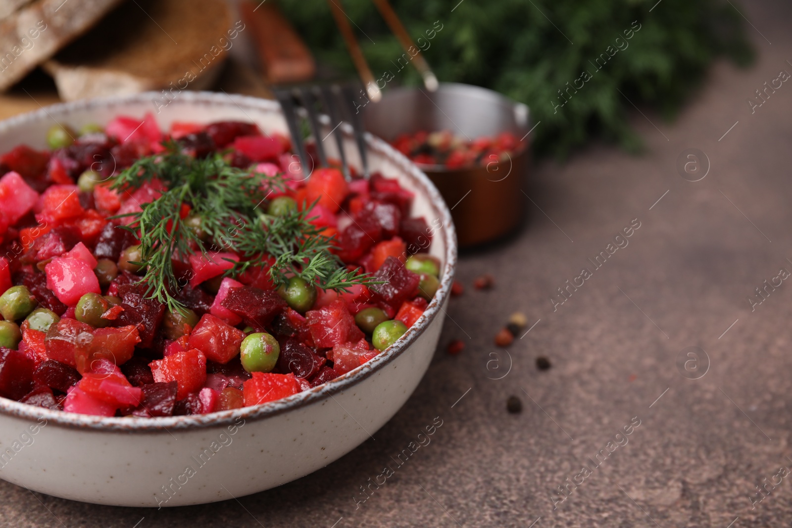 Photo of Delicious vinaigrette salad on grey table, closeup. Space for text