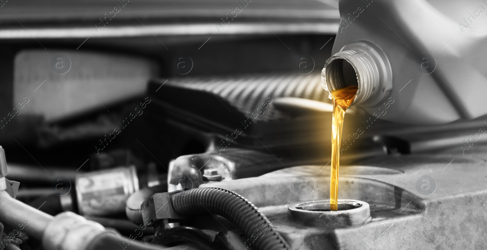 Image of Pouring motor oil into car engine, color accent effect. Banner design