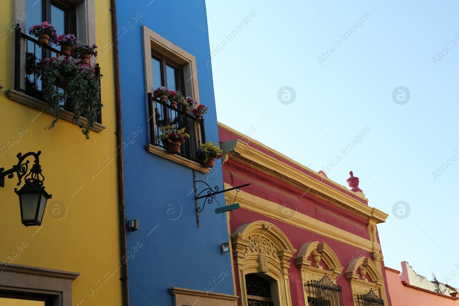 Photo of San Pedro Garza Garcia, Mexico - September 25, 2022: Beautiful colorful buildings on city street